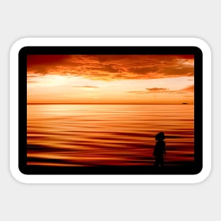 figure on the beach at sunset Sticker